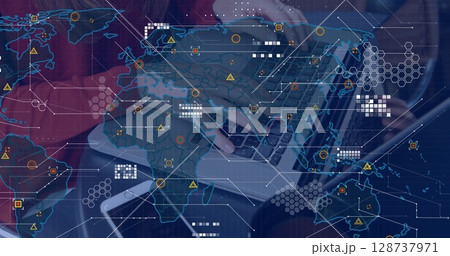Image of world map over person using laptop Image of world map over person using laptop 128737971