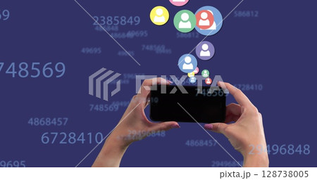 Multiple profile icons floating and changing numbers over hand holding a smartphone Multiple profile icons floating and changing numbers over hand holding a smartphone 128738005