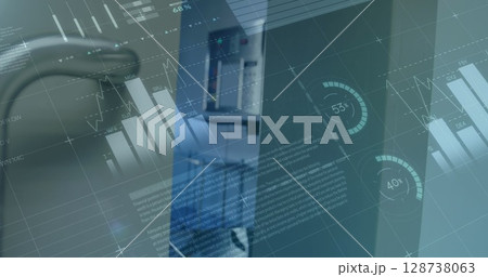 Displaying data dashboard overlaying office metal panels, with charts, rings, binders and chair 128738063