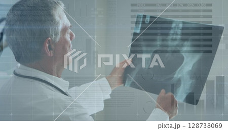 Image of financial data processing over caucasian doctor 128738069