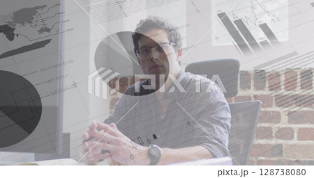 Image of data processing over caucasian businessman writing 128738080