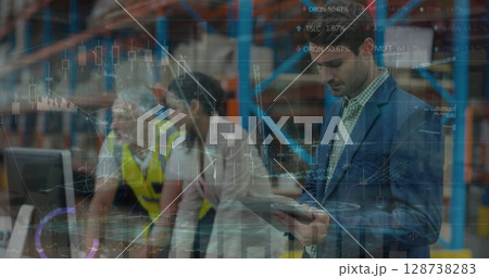 Image of data processing over caucasian male supervisors using digital tablet at warehouse 128738283