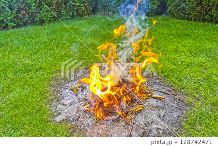 Campfire and smoke in the garden in Brest Belarus. 128742471