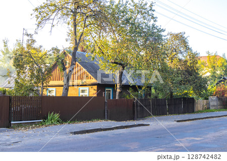 Brest Belarus colorful village streets with wooden huts brick houses . 128742482