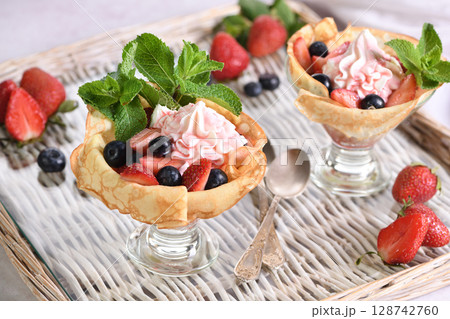French Crepes with Filling and Fruit French Crepes with Filling and Fruit 128742760