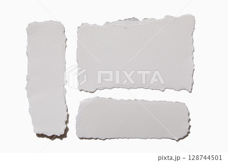 Torn white paper on white background 128744501