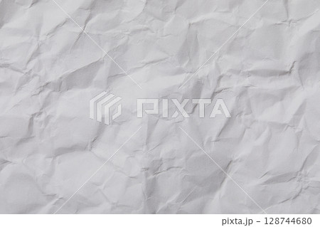 Close-up of wrinkled white paper Close-up of wrinkled white paper 128744680