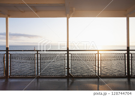 Sunrise over ocean seen from ferry Sunrise over ocean seen from ferry 128744704