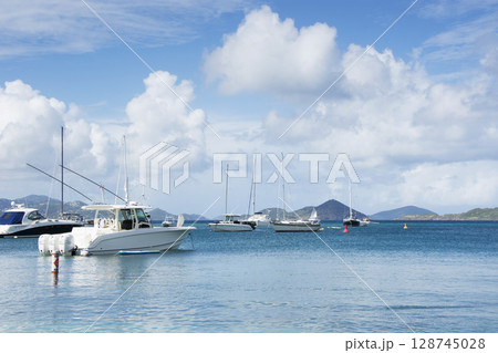 Boats moored at Cruz Bay on sunny day Boats moored at Cruz Bay on sunny day 128745028