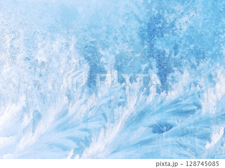 Close-up of frost pattern on window glass Close-up of frost pattern on window glass 128745085