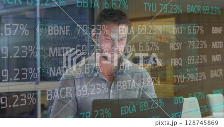 Image of data processing over caucasian businessman using laptop in office 128745869