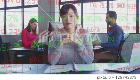 Image of stock market data processing over portrait of asian woman talking looking at the camera 128745879