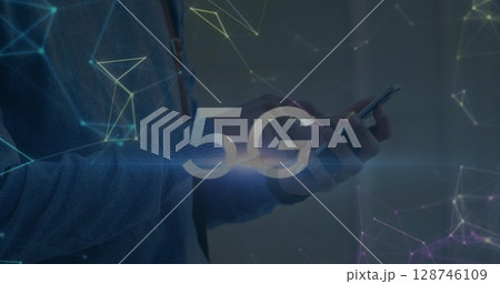 5g text and network of connections against mid section of a person using smartphone 5g text and network of connections against mid section of a person using smartphone 128746109