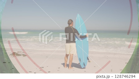 Image of banner with copy space over rear view of a man with surfboard at the beach 128746294