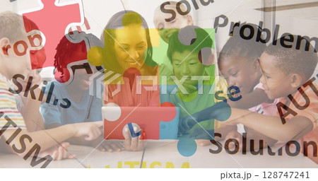 Image of puzzle and autism texts over female teacher and diverse pupils at school 128747241