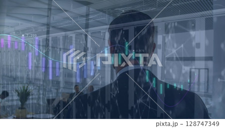 Image of financial graphs over back view of businessman walking in office Image of financial graphs over back view of businessman walking in office 128747349