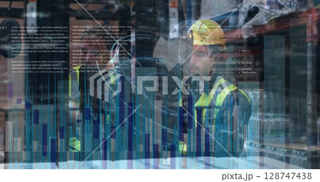Image of statistical data processing over two male workers discussing at warehouse 128747438