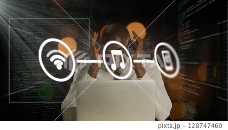Image of network of connections with icons over african american businessman and data processing 128747460