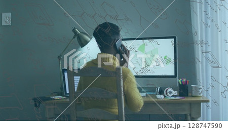 Image of data processing over african american businesswoman using smartphone 128747590