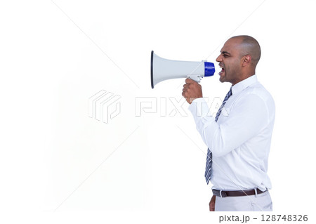 African American man in business attire shouting through megaphone in white studio, copy space 128748326