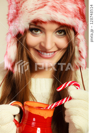 Woman with christmas sweets 128748514
