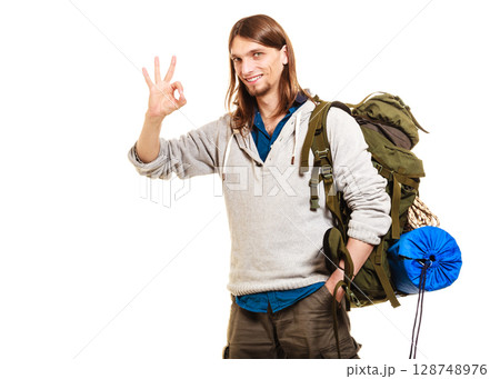 Man tourist backpacker showing ok gesture. Travel. 128748976
