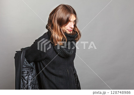 Handsome fashion man getting dressed. 128748986