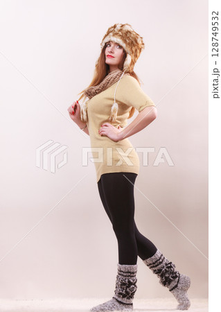 Beautiful winter woman in warm clothing 128749532