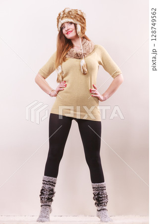 Beautiful winter woman in warm clothing 128749562
