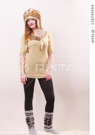 Beautiful winter woman in warm clothing 128749564