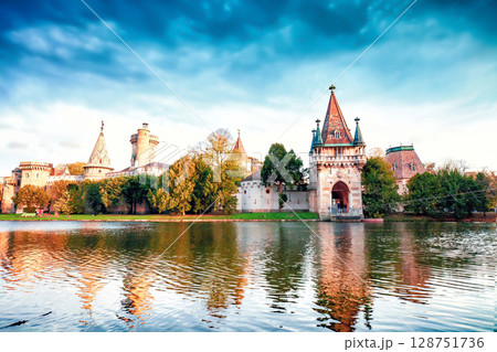Medieval Franzensburg castle on lake in autumn Laxenburg park, Lower Austria 128751736