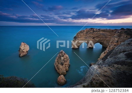 Arch Rock & Sunset 128752384