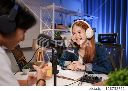 People in the podcast studio talking and recording 128752762