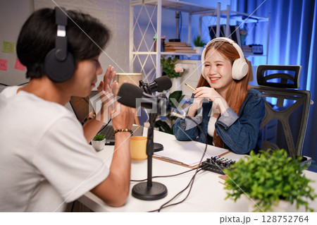 People in the podcast studio talking and recording People in the podcast studio talking and recording 128752764