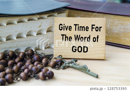 Give Time For The Word of God text on wooden block with Holy Bible and Holy Rosary background. Christianity concept. Give Time For The Word of God text on wooden block with Holy Bible and Holy Rosary background. Christianity concept. 128753393
