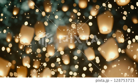 Yi Peng lanterns floating in night sky during Loi Krathong festival, background 128753715
