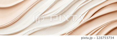 Fluid cosmetics textures spread with highlighter cream, abstract background 128753734