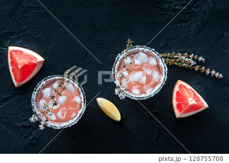 Salty Dog cocktail with fresh grapefruit juice, lime juice, and thyme Salty Dog cocktail with fresh grapefruit juice, lime juice, and thyme 128755708