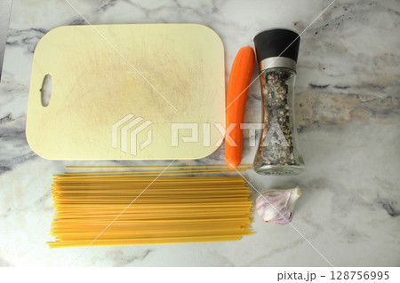 Recipe concept for pasta bolognese spaghetti vegetables minced meat top view 128756995