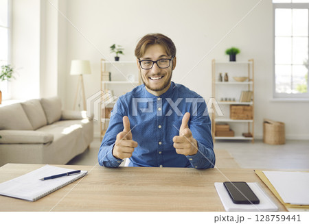 Male consultant who persuades client to accept good offer by talking on video call. 128759441