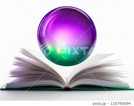 開いた本の上に紫緑色の球が浮かんでいる 128760094