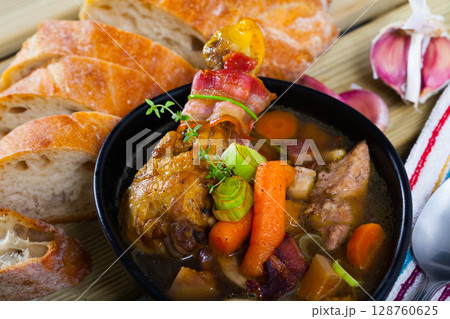 Tasty scottish traditional soup cock-a-leekie with chicken, bacon and leek 128760625