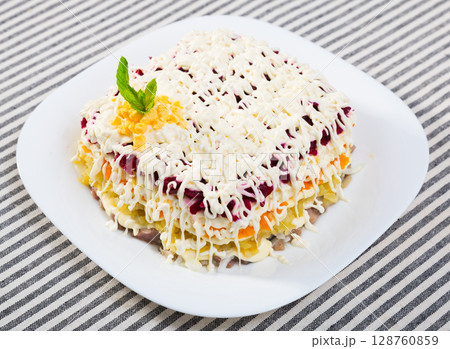 Dressed herring salad Dressed herring salad 128760859