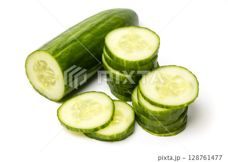 Photo of sliced green ripe natural organic cucumber isolated on white background 128761477