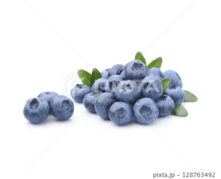 Sweet blueberries with leaves on white backgrounds Sweet blueberries with leaves on white backgrounds 128763492