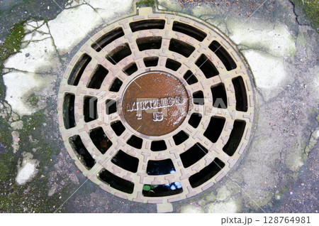 Metal round hatch with numbers. Metal round hatch with numbers. 128764981