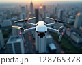 Modern drone flying over a cityscape at sunset. Aerial photography and videography technology in an urban environment. Image generated by AI 128765378