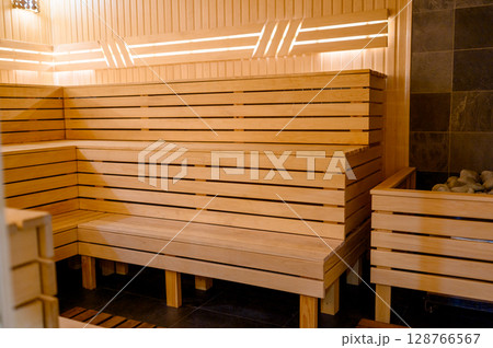 Empty Sauna room background. Wooden sauna, spa room. 128766567