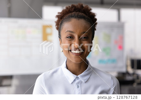 Head shot portrait of self-assured African businesswoman Head shot portrait of self-assured African businesswoman 128767128