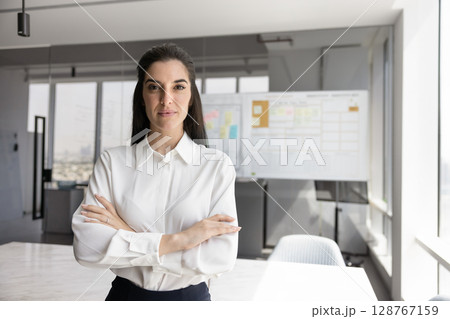 Office portrait of young professional business woman Office portrait of young professional business woman 128767159